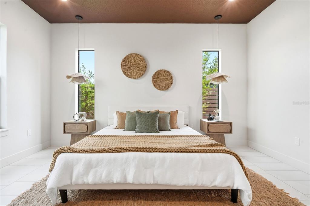 1615 Cole Road Orlando, FL 32803 - Photo 12 of 31 a bedroom with a bed and window