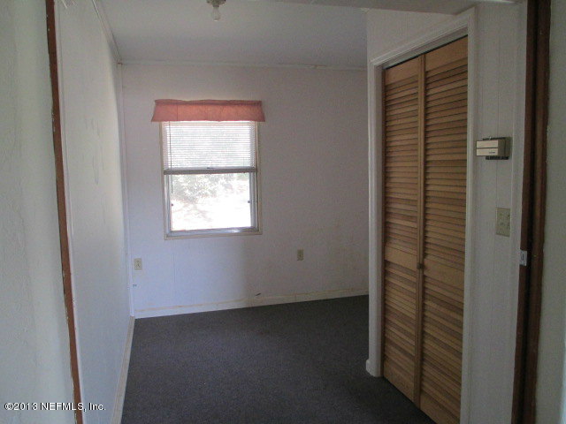 6444 Brooklyn Bay Road Keystone Heights, FL 32656 - Photo 11 of 32 a view of an empty room with a window