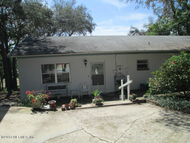 6444 Brooklyn Bay Road Keystone Heights, FL 32656 - Photo 21 of 32 a front view of a house with patio