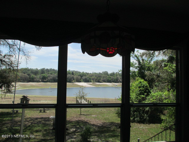 6444 Brooklyn Bay Road Keystone Heights, FL 32656 - Photo 22 of 32 a view of lake from a balcony