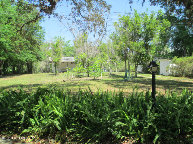 6444 Brooklyn Bay Road Keystone Heights, FL 32656 - Photo 29 of 32 a view of outdoor space with a garden