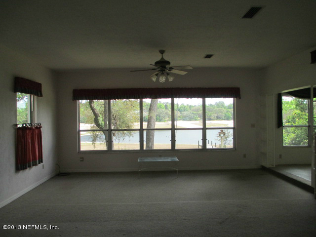 6444 Brooklyn Bay Road Keystone Heights, FL 32656 - Photo 3 of 32 a view of an empty room with a window