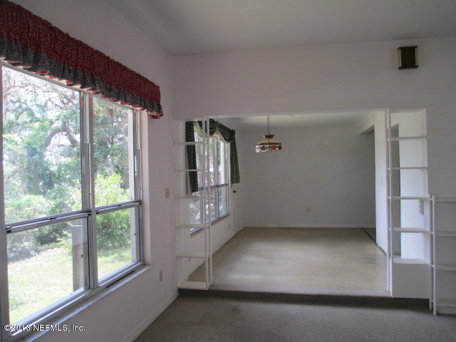 6444 Brooklyn Bay Road Keystone Heights, FL 32656 - Photo 5 of 32 an empty room with windows