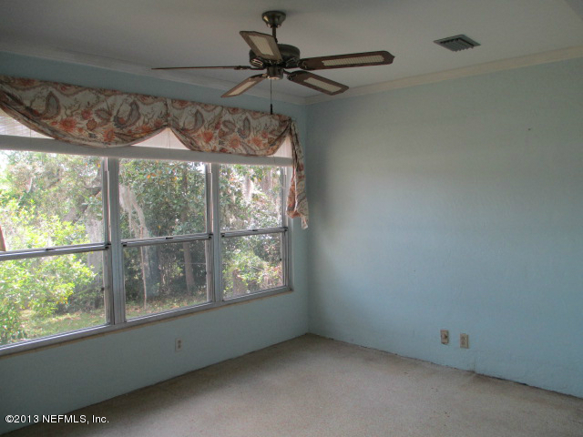 6444 Brooklyn Bay Road Keystone Heights, FL 32656 - Photo 9 of 32 a view of a room with a window