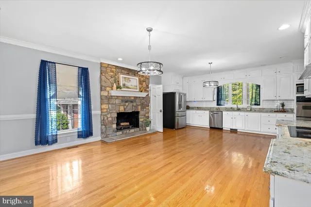 a house with pool in front of it