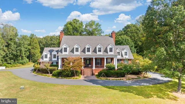 a view of balcony with floor to ceiling windows yard and outdoor seating