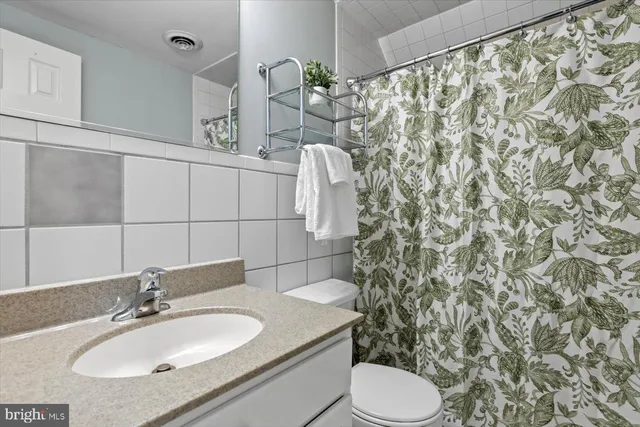 a vase of flowers sitting on a table