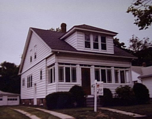 59 Ellerton Street Chicopee, MA 01020 - Photo 1 of 1 a front view of a house with a porch