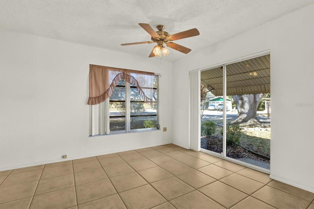 8410 Elgin Drive Port Richey, FL 34668 - Photo 11 of 37 a view of an empty room with a window
