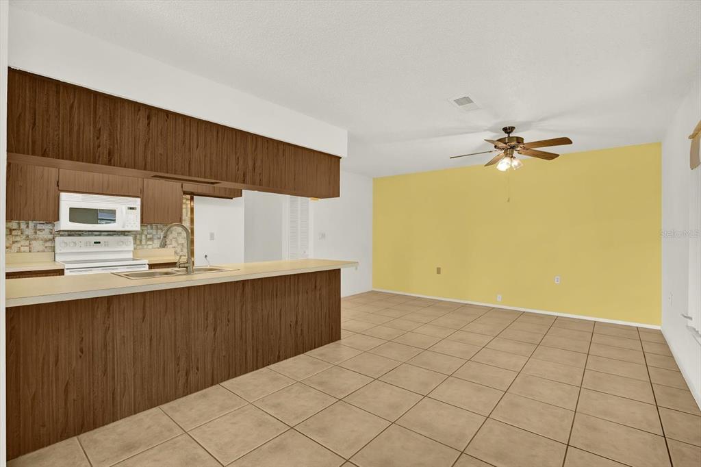 8410 Elgin Drive Port Richey, FL 34668 - Photo 18 of 37 a view of a kitchen with a sink