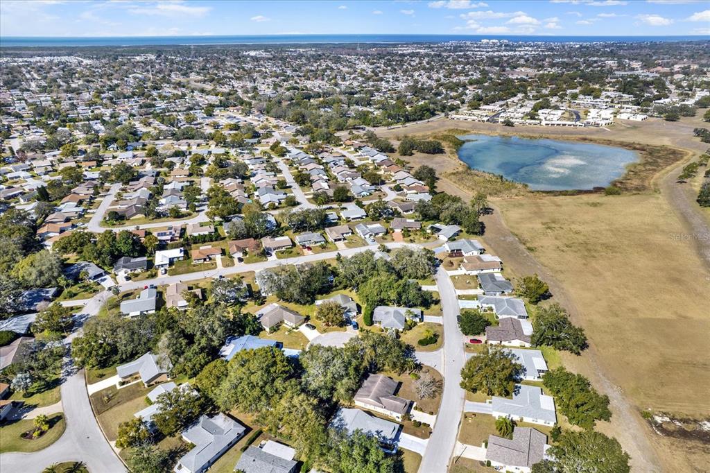 8410 Elgin Drive Port Richey, FL 34668 - Photo 37 of 37 an aerial view of residential houses with outdoor space