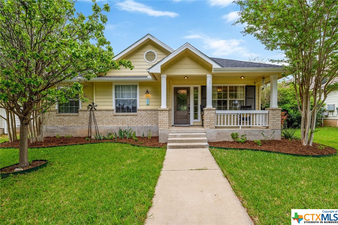 177 Village Commons Boulevard Georgetown, TX 78633 - Photo 1 of 1 a front view of a house with a yard