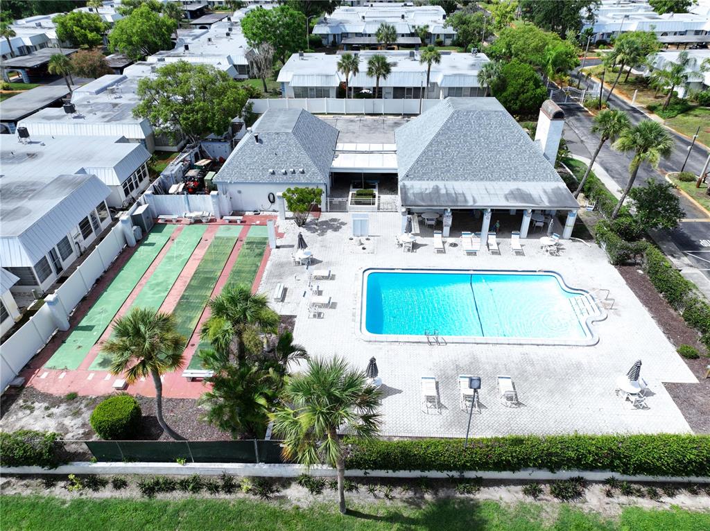 4227 Sheldon Place New Port Richey, FL 34652 - Photo 22 of 25 an aerial view of a house with outdoor space swimming pool and outdoor seating