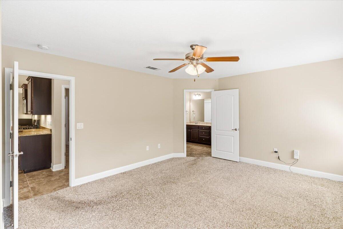 2256 Reed Ridge Court Navarre, FL 32566 - Photo 20 of 44 Master bedroom