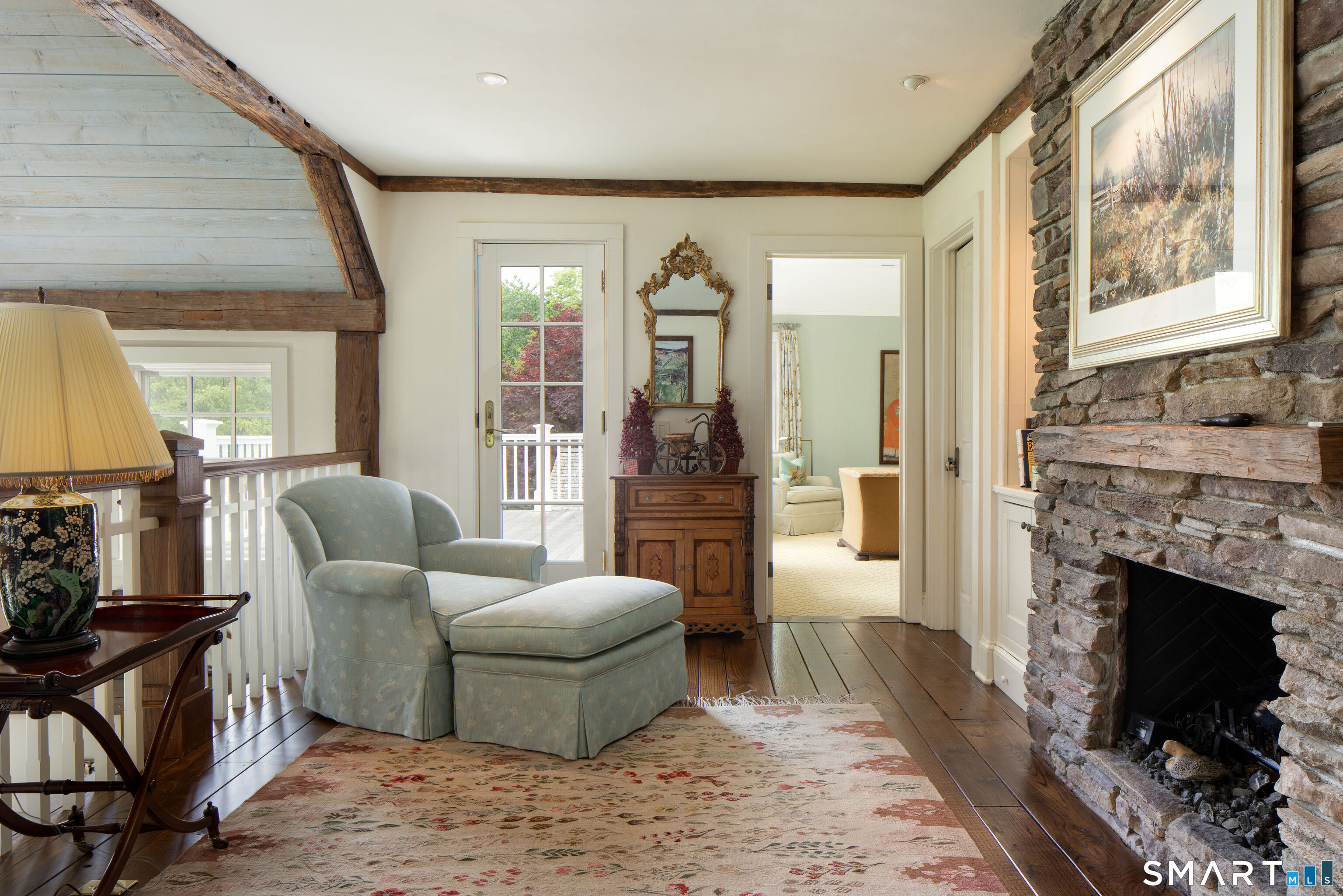 57 Indian Trail Road New Milford, CT 06776 - Photo 26 of 40 This lofted sitting room is part of the primary suite.