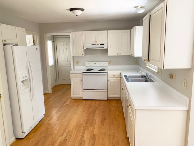 4529 Birmingham Way Raleigh, NC 27604 - Photo 10 of 26 The kitchen can be accessed from the side door entry, where you'll also find a convenient first floor washer/dryer and private half bath tucked away. All appliances convey! Kitchen
