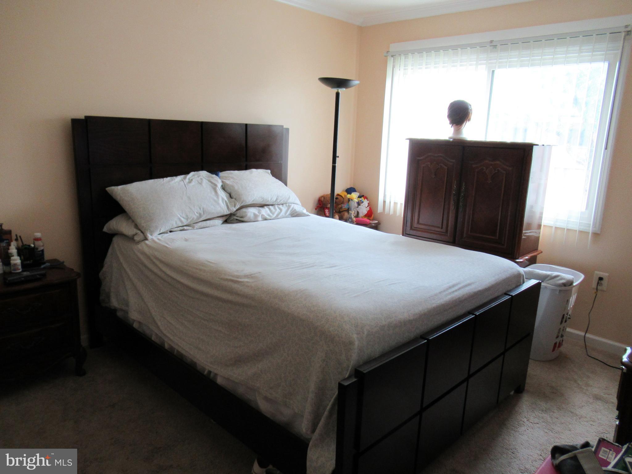 3812 Bel Pre Road, Unit 9 Silver Spring, MD 20906 - Photo 8 of 12 Master bedroom. Walk-in closet.