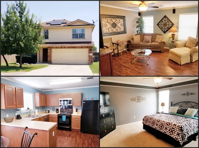 a living room with furniture kitchen view and a window