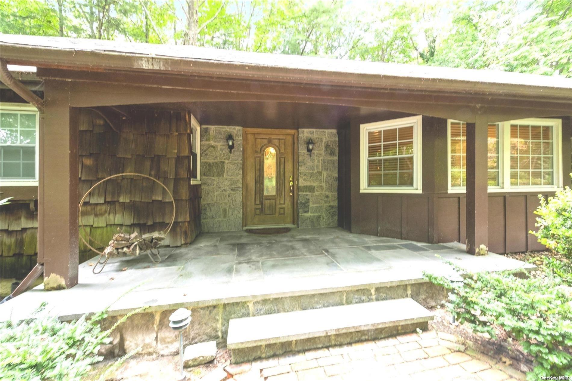 a view of entrance front of house