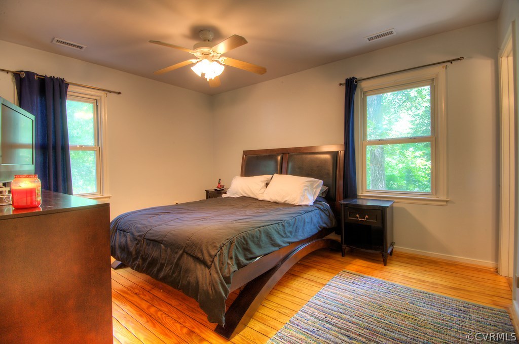 8430 Boones Trail Road Chesterfield, VA 23832 - Photo 13 of 24 a bedroom with a bed and window