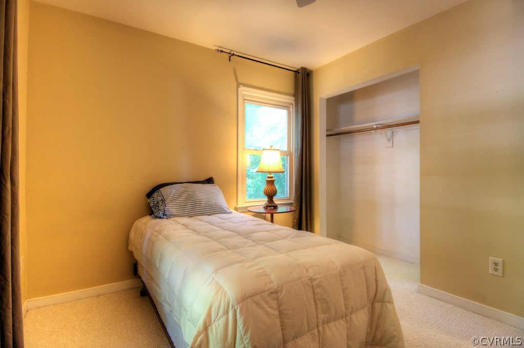 8430 Boones Trail Road Chesterfield, VA 23832 - Photo 16 of 24 a bedroom with a bed and a window