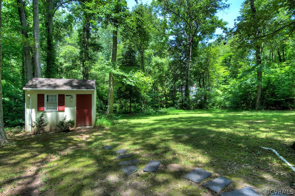 8430 Boones Trail Road Chesterfield, VA 23832 - Photo 21 of 24 a view of a big yard with plants and large trees