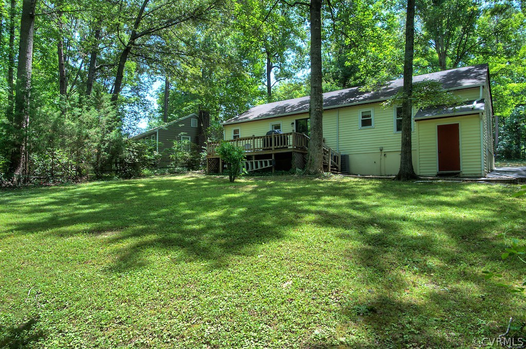 8430 Boones Trail Road Chesterfield, VA 23832 - Photo 22 of 24 a view of a house with a yard