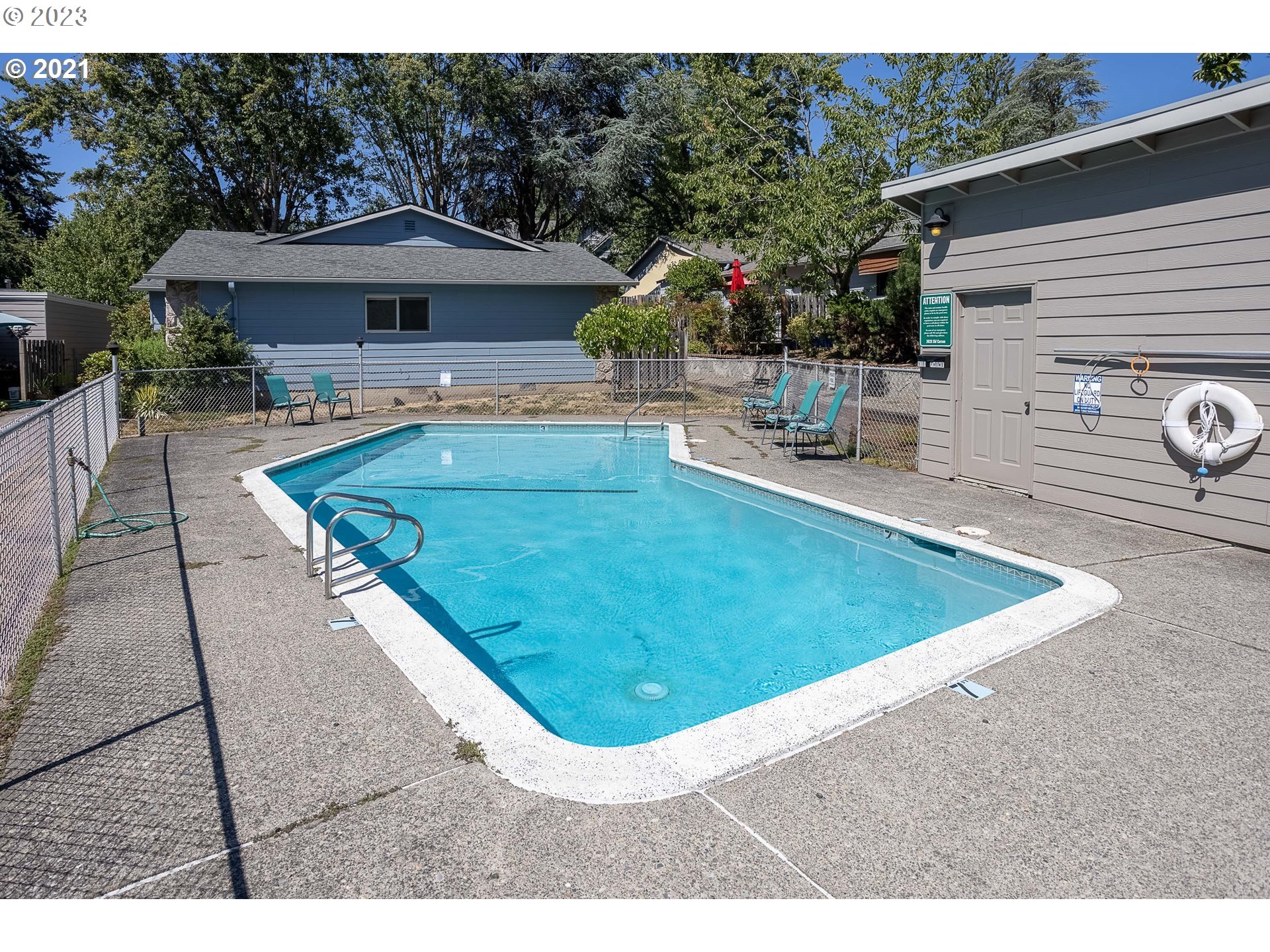 8421 Southwest 30th Avenue Portland, OR 97219 - Photo 28 of 28 a view of a house with pool