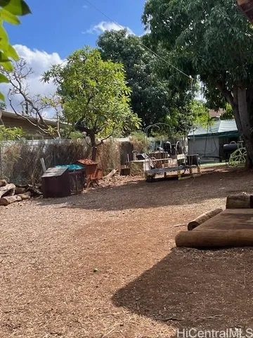 a view of street with parked cars