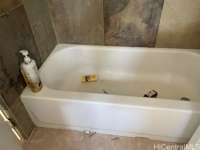 a bathroom with a bathtub