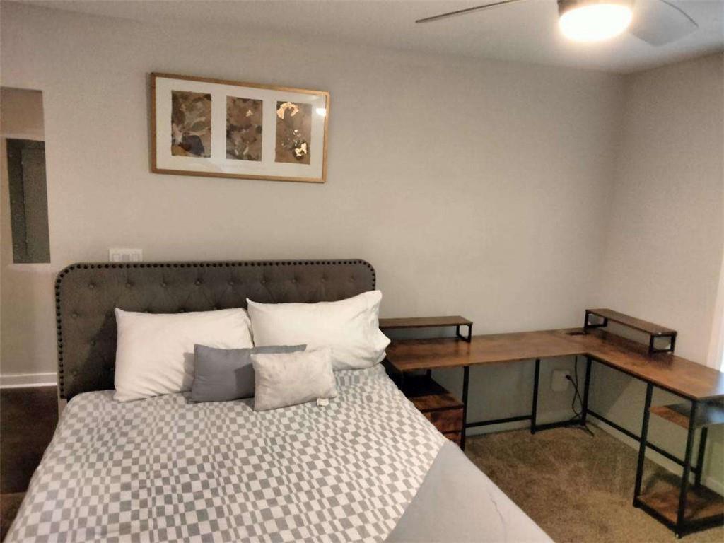 2130 Keheley Drive Decatur, GA 30032 - Photo 13 of 23 a bedroom with a bed and wooden floor