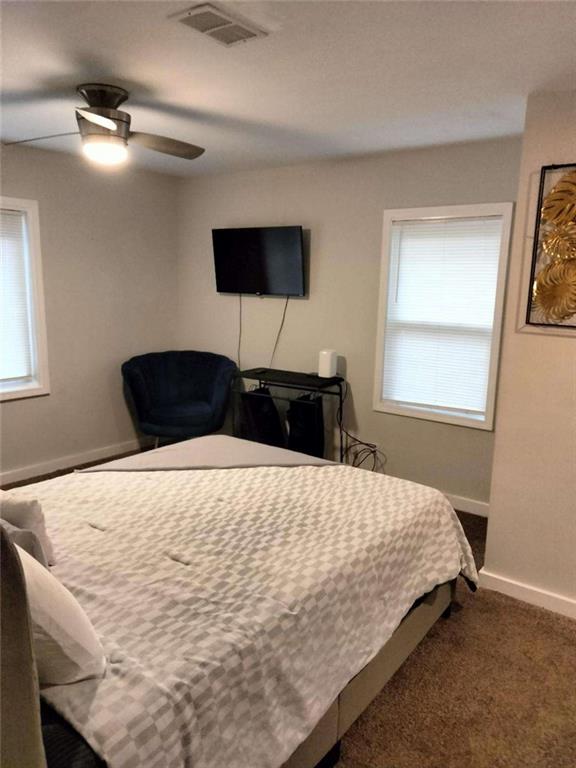 2130 Keheley Drive Decatur, GA 30032 - Photo 17 of 23 a bedroom with a bed and a window