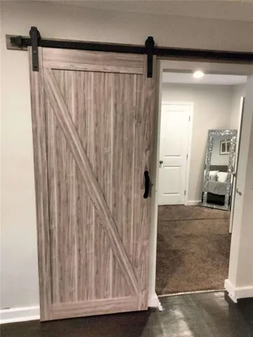 a en suite bathroom with a sink and mirror
