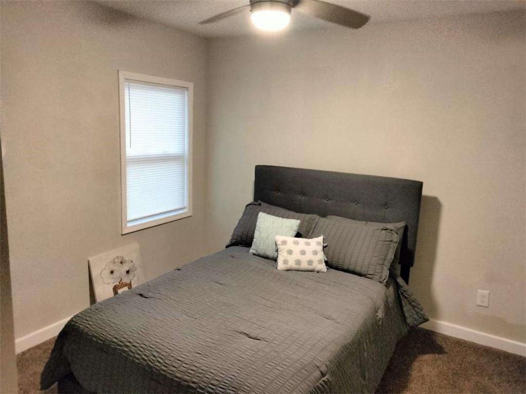 2130 Keheley Drive Decatur, GA 30032 - Photo 20 of 23 a bedroom with a bed and window