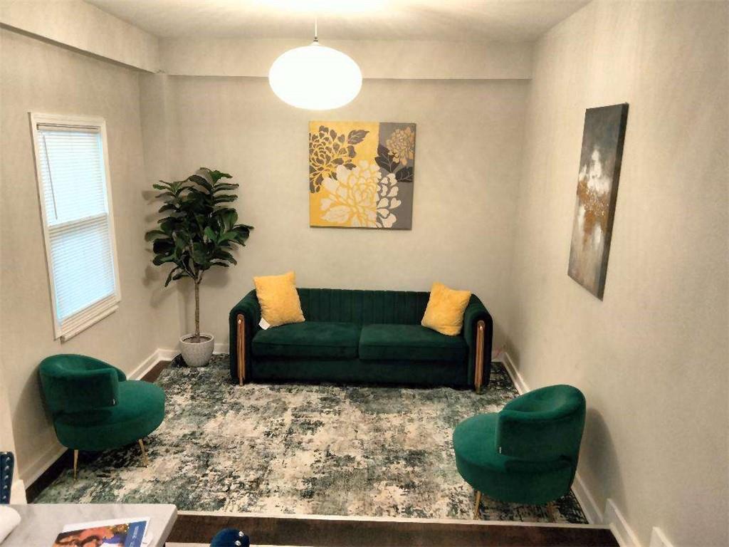 2130 Keheley Drive Decatur, GA 30032 - Photo 21 of 23 a living room with furniture and a potted plant