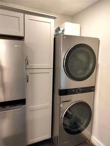 a bathroom with a shower and toilet