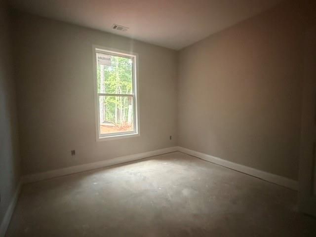 745 Mulberry Rock Road Temple, GA 30179 - Photo 9 of 33 an empty room with a window