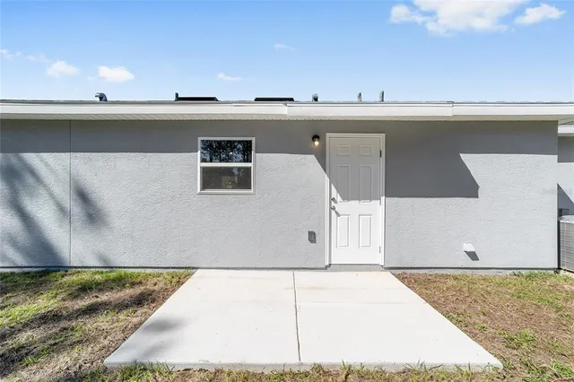 a large house with a garden