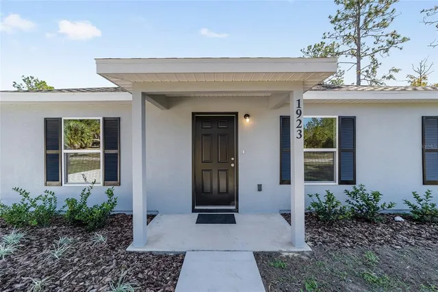a view of a entryway door front of house