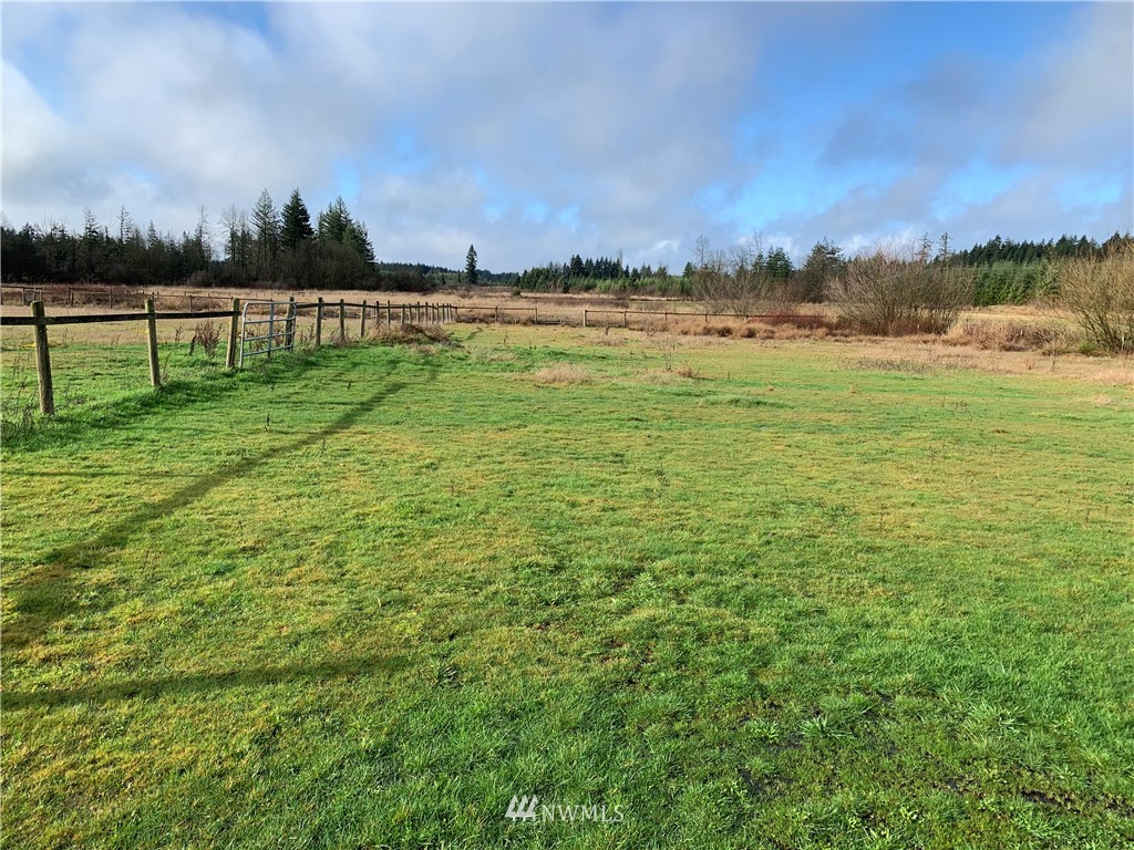 312 Meier Road Winlock, WA 98596 - Photo 14 of 18 a view of a lake with houses in the back