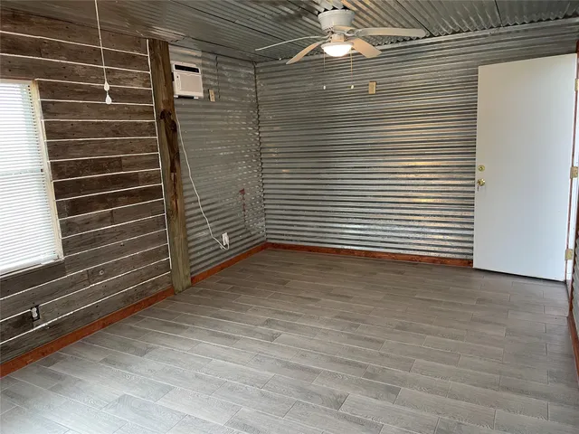 a view of a door and a window