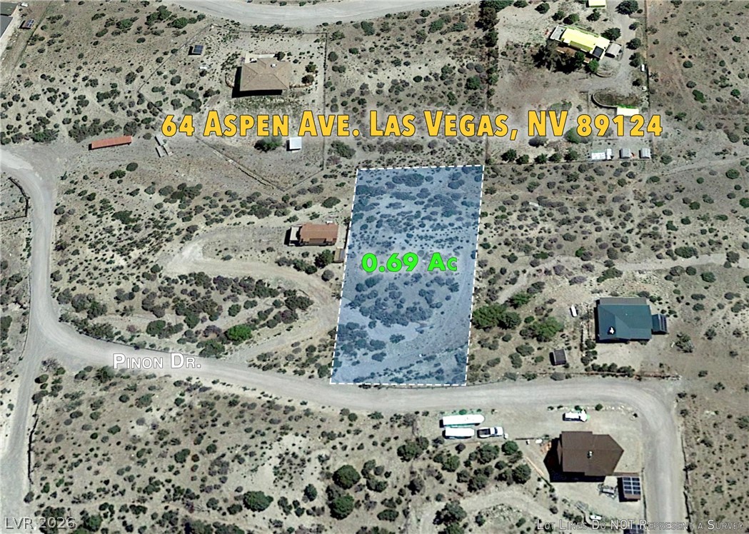 64 Aspen Road Las Vegas, NV 89124 - Photo 4 of 8 A valuable desert parcel, ready for development, surrounded by rugged natural beauty.