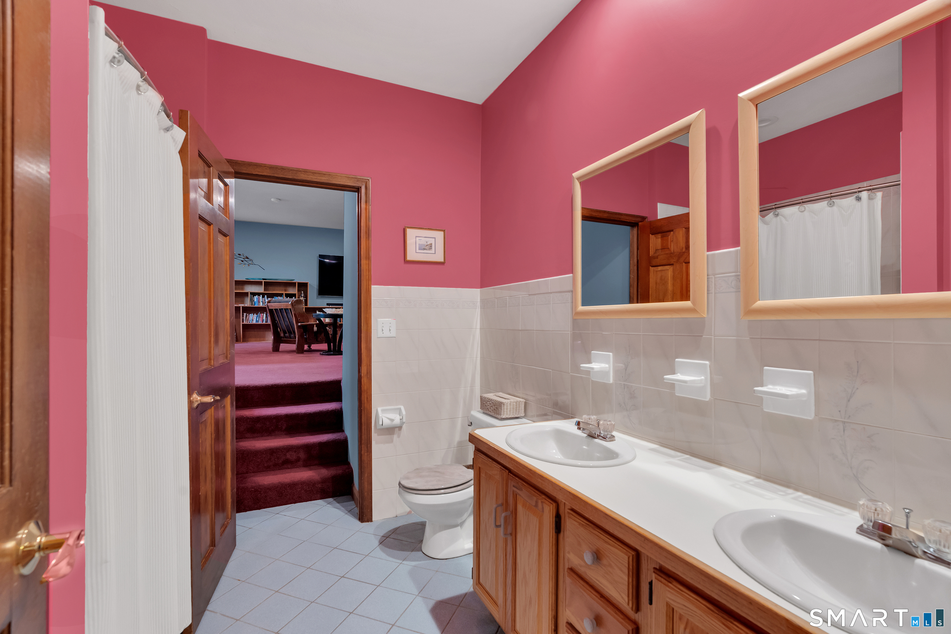 194 Quaker Farms Road Oxford, CT 06478 - Photo 28 of 40 a bathroom with a sink vanity and a mirror