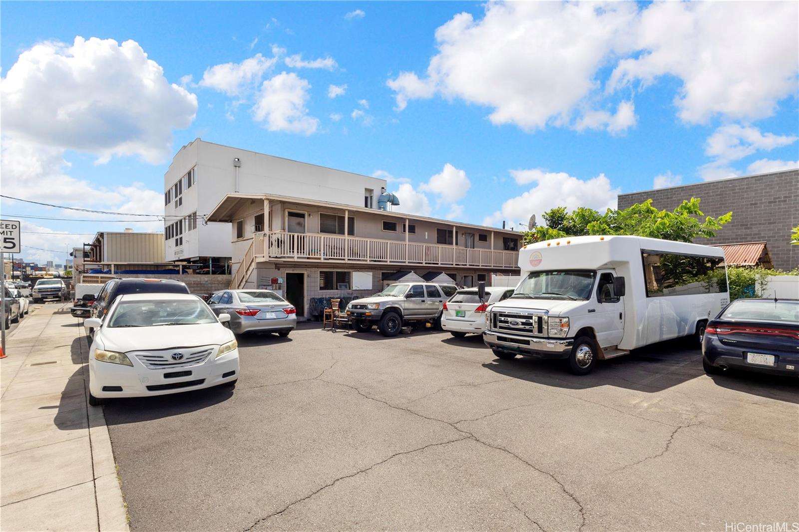 219 Kalihi Street Honolulu, HI 96819 - Photo 3 of 25 a car parked in front of a house