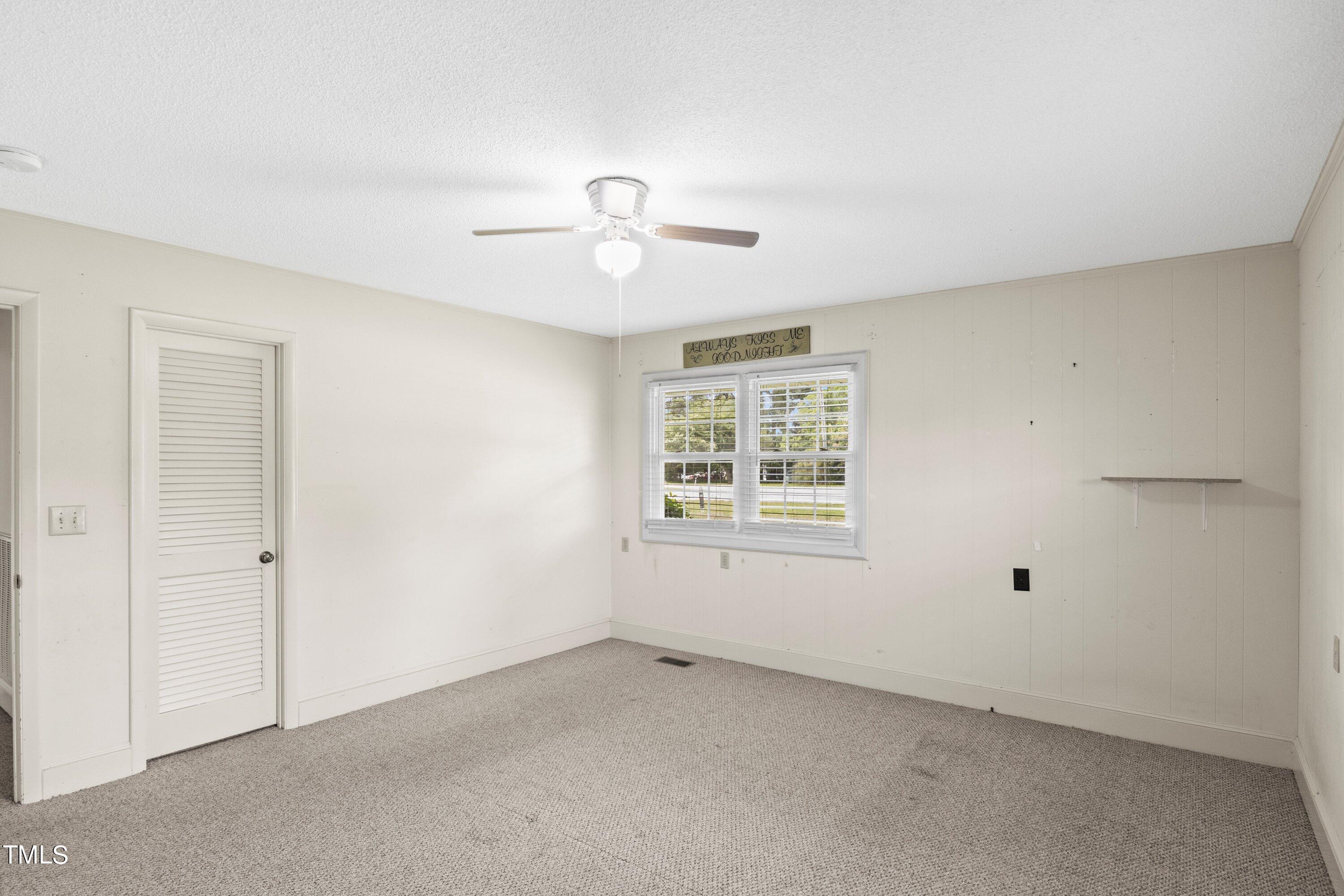 11 Partin Road Dunn, NC 28334 - Photo 27 of 46 a view of an empty room with a window