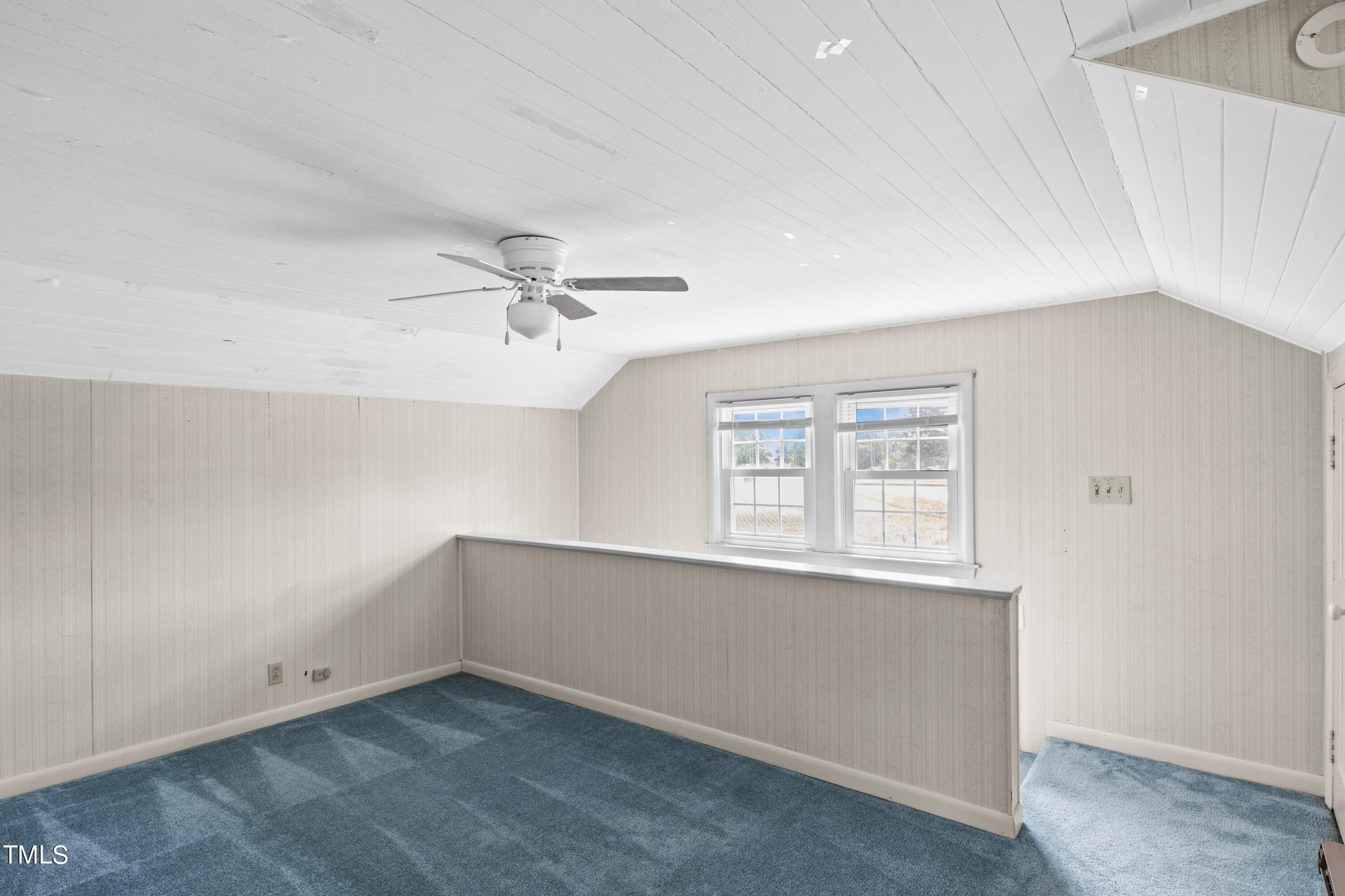 11 Partin Road Dunn, NC 28334 - Photo 31 of 46 an empty room with a window and a ceiling fan