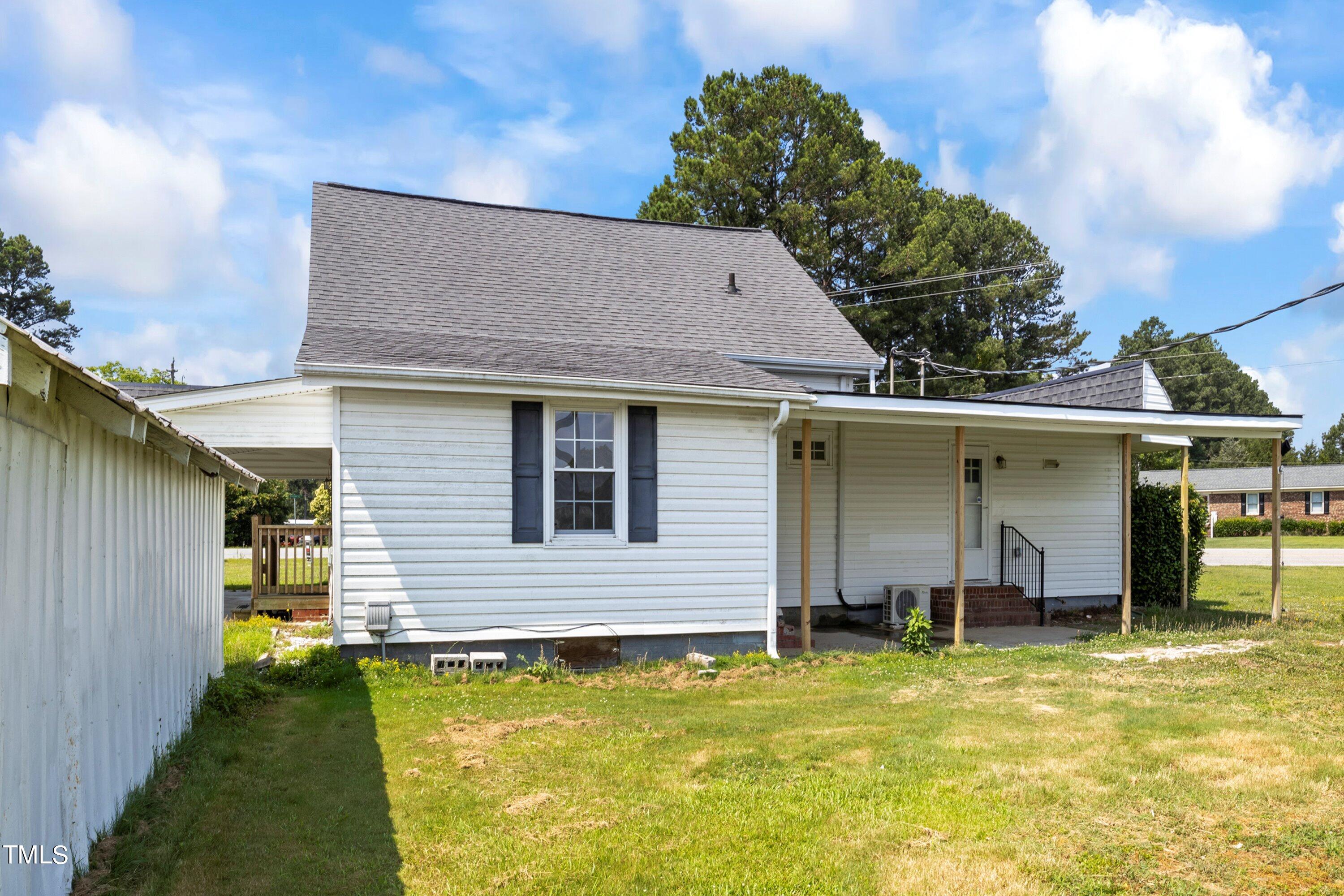 11 Partin Road Dunn, NC 28334 - Photo 45 of 46 a view of a house with pool and furniture