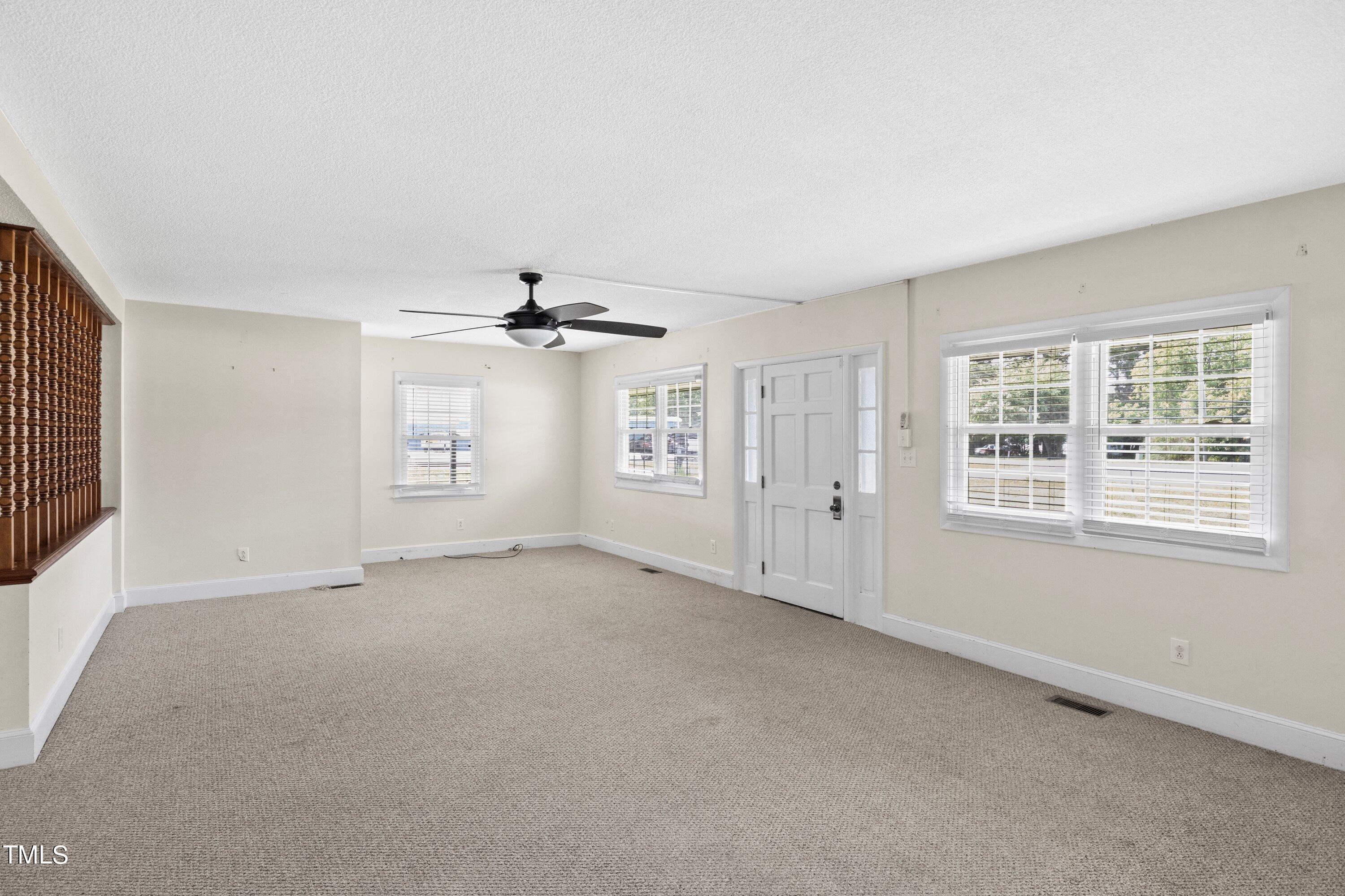 11 Partin Road Dunn, NC 28334 - Photo 7 of 46 a view of an empty room with a window