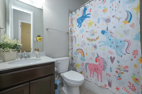 a bathroom with a sink and toilet