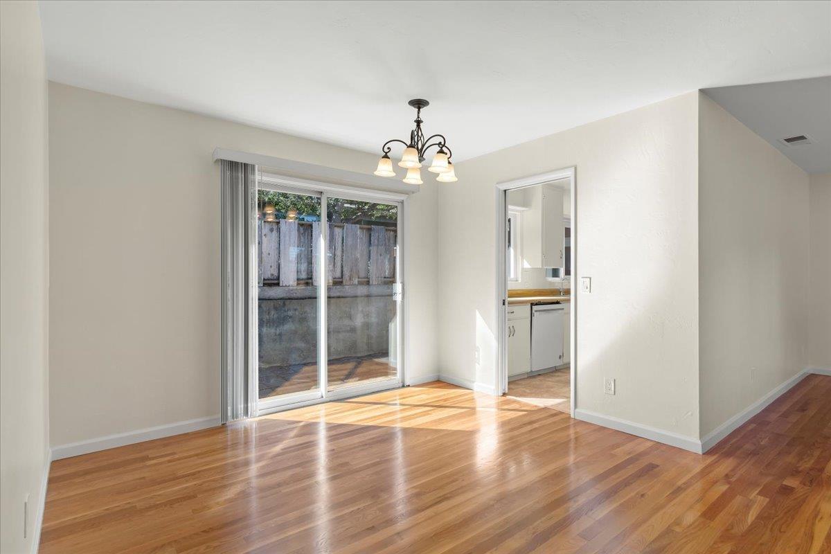 41 Ralston Drive Monterey, CA 93940 - Photo 13 of 31 a view of an empty room with wooden floor and a window